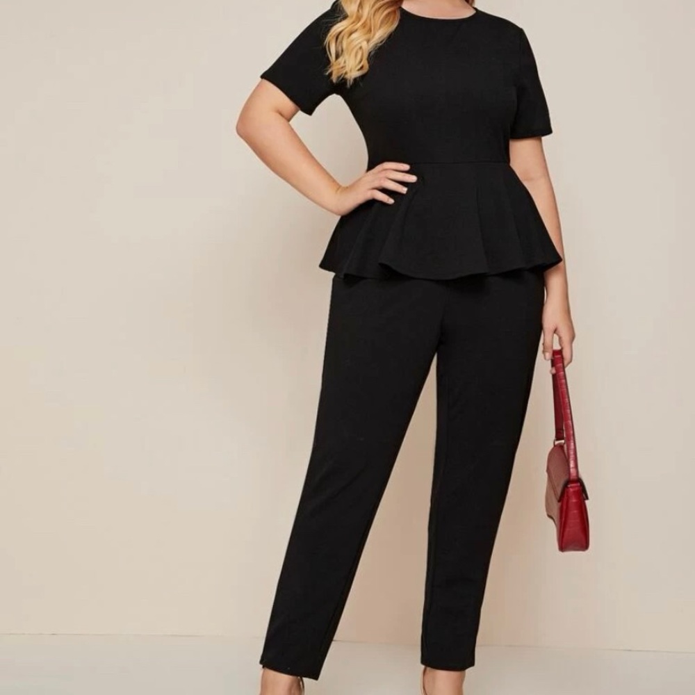 XL Black Zip Peplum jumpsuit.